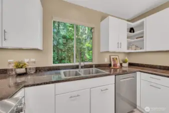 Lots of storage including a deep walk-in pantry around the corner