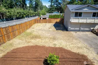 Large side yard with space for access