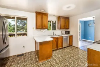 Kitchen with potential and appliances to stay