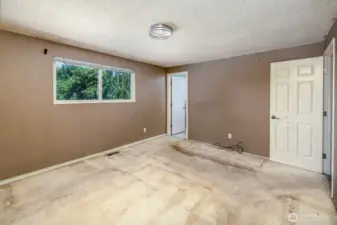Primary bedroom with in-suite bathroom