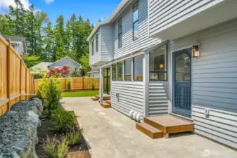 A spacious south facing patio off the kitchen and great room provides the perfect setting for entertaining and outdoor gatherings.