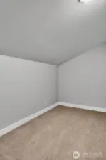 Secret room behind the closet is perfect for a play area or a cozy reading nook.