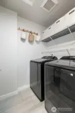 Third level utility room. Washer & Dryer stays!
