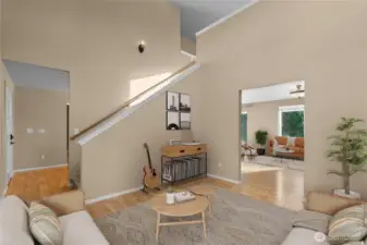 Room adjacent to entry - could serve as dining room or living space as virtually staged.