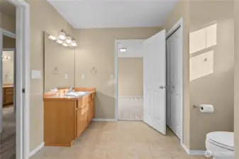 Jack-n-Jill bathroom between guest bed 1 (ahead) 2 (behind), and hallway to left.