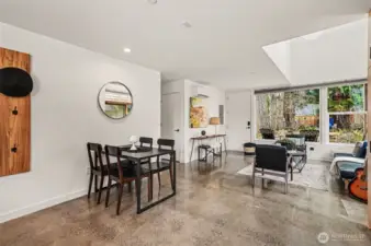This angle shows the hallway to the main floor bedroom and 3/4 bath as well as closet to the washer & dryer