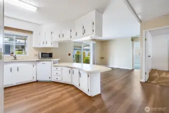 The expansive kitchen offers lots of cabinet and counter space.