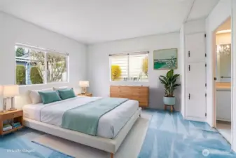 The primary bedroom is shown here virtually staged!