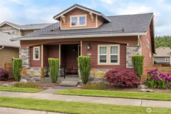 Charming street appeal with extensive stone and a lovely front porch.  Mature landscaping that will only look better in Spring/Summer!  Just steps to the Seven Summits Lodge, Post & Pour, reatil and miles of trails!