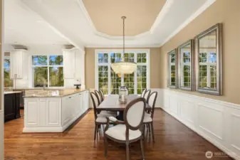 Beautiful wood floors throughout the main level. The floorplan provides flexible and comfortable living, including a den/office and upper-floor bonus room with surround sound.  Dual staircases provide easy access to the upper level.