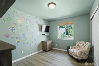 One of the bedrooms that features a space saving murphy bed!