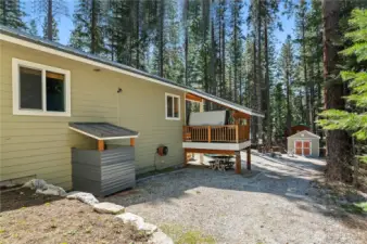 Side view of this low maintenance yard.