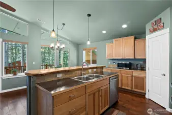 Beautiful Hickory wood cabinets and flooring. Plenty of counter and cabinet space along with the convenient pantry.