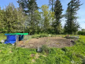 Pig pen to the right of house, enclosure will be removed before sellers vacate property.