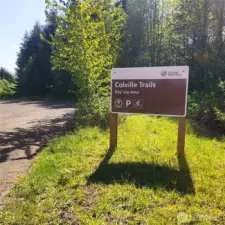 Parking lot across the road at trail head.