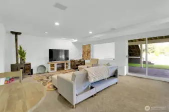 Lower level bedroom with 6 foot window and slider