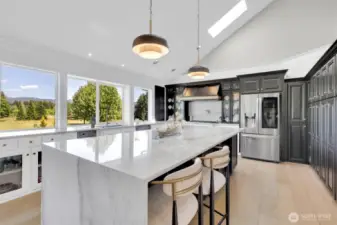 updated kitchen with quality waterfall quartzite