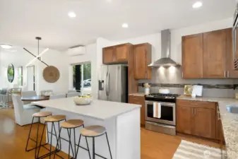 Ample cabinetry in the Kitchen and a pantry to the left provide several storage options. Newer refrigerator and dishwasher!