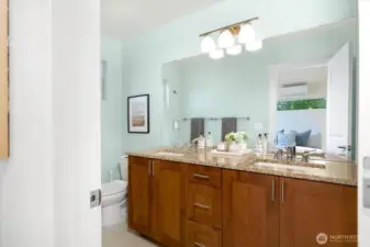 Lots of cabinet and storage space in the primary bath!