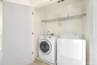 Upstairs utility closet for added convenience.