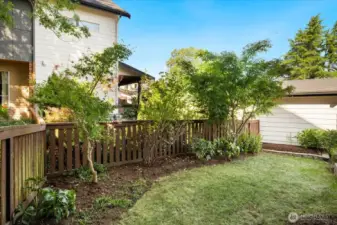 Large fully fenced backyard with play space and areas for gardening!