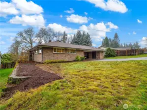The back yard is fenced to keep the furry friends safe.