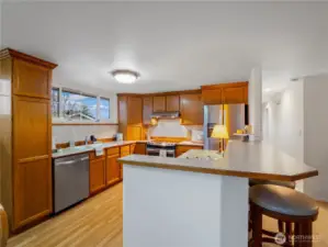 You can belly up to counter to eat your cereal or eat at the dining room table.