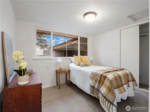 The smaller of the two bedrooms.