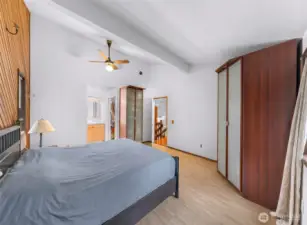 Primary bedroom with attached bathroom