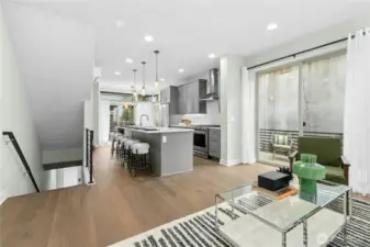 This open-concept living room, kitchen, and dining offer the perfect layout for entertaining guests and having get togethers!