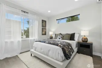 Primary suite with 3 closets, and en-suite bath.