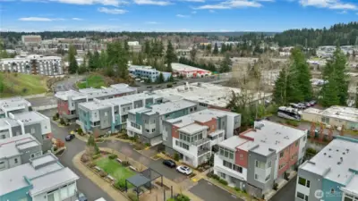 Drone shot of complex with common area in center. Perfect for taking the pups out or having an outdoor get together.