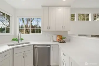 Storage, function and all right off the rec room with tall ceilings and great high windows for natural light.