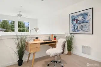 Upstairs hall loft, great for a little office set-up with clear story windows and loads of natural light.