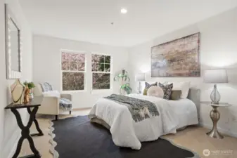 Upstairs bedroom with fresh paint, carpets & nice outlooks.