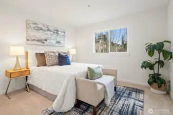 Upstairs 2nd bedroom - all fresh carpets and paint. Another nice outlook to open spaces.