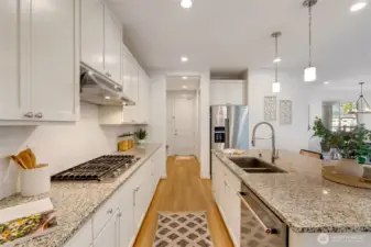 Garage entry breezes past huge walk in pantry and built in bench