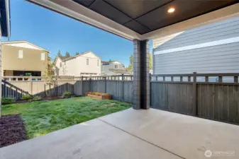 Fully covered back patio with gas hook ups