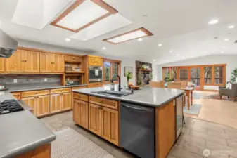 Open living space with large windows and wooded views