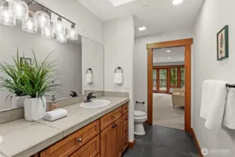 Bathroom with double vanity, ample storage, and clean finishes