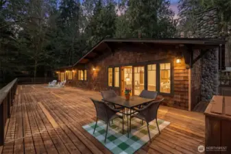 Evening on the wraparound deck with warm light and total privacy