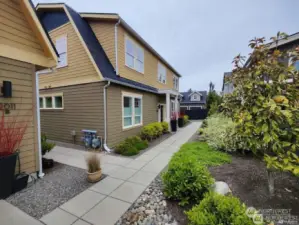 Entry walkway leading to primary home and sideyard