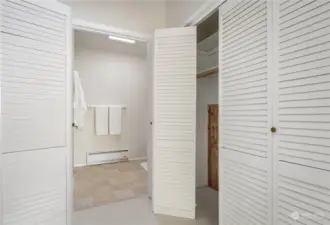 Cedar lined closets leading to bathroom