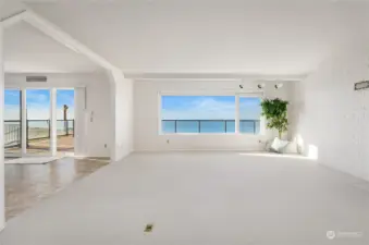 Living room is open to Dining room where there is access to the wonderful View Deck