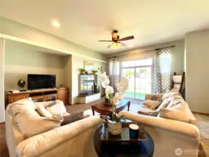Living room with a slider to the patio