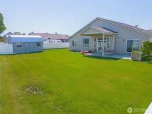 Backyard includes a nice shed