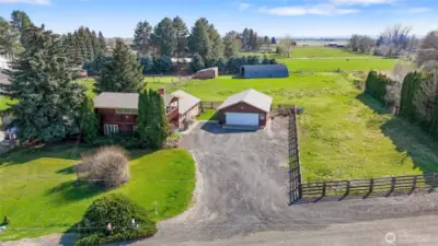 2 car garage is extended to fit 4 cars or add a nice work shop in the back.
