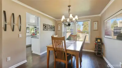 Spacious dining room with direct access to the kitchen and living room- perfect for everyday meals.