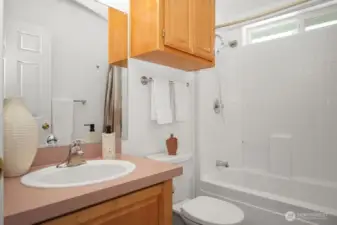 Full bathroom with bathtub