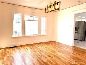 Dining room with view of kitchen off to the right.